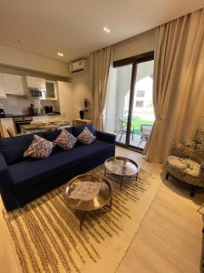 Posezení v ubytování Hawana Salalah Poolside Apartment