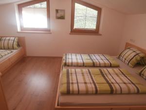 Ένα ή περισσότερα κρεβάτια σε δωμάτιο στο Landhaus Claudia