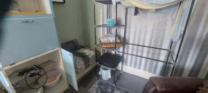 a small room with a bed and a window at Felixstowe room lets in Felixstowe