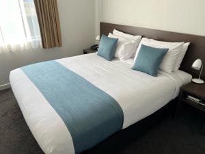 Postel nebo postele na pokoji v ubytování Airport Delta Motel