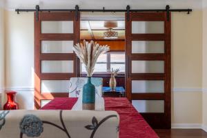 a dining room with a table and two bunk beds at The Italian Farmhouse in Cleveland Heights