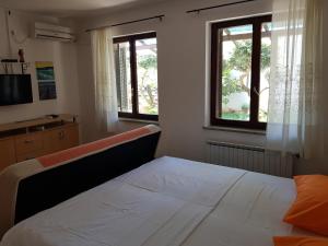 Postel nebo postele na pokoji v ubytování tramontana