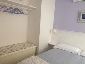 Letto o letti in una camera di La Linea D'Acqua