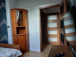 Televisyen dan/atau pusat hiburan di Suwałki Centrum Apartament