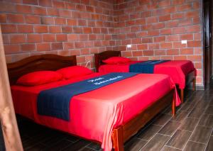 Voodi või voodid majutusasutuse Hotel International toas