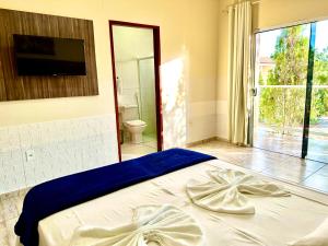 Postel nebo postele na pokoji v ubytování Hotel São Francisco