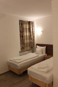 Posteľ alebo postele v izbe v ubytovaní Esprit Hotel