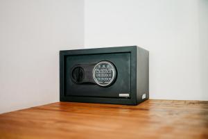 a small television sitting on top of a wooden floor at Travel Room Lipah Beach in Amed +2 photos