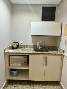 Dapur atau dapur kecil di Flat Completo - LakeSide Hotel