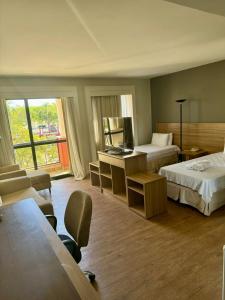 Katil atau katil-katil dalam bilik di Flat Completo - LakeSide Hotel