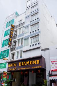 a hotel channel building with a hotel sign on it at Diamond Hotel CMT8 - Center SaiGon in Ho Chi Minh City