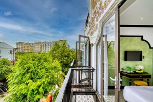 Balkón nebo terasa v ubytování Rokas Hoi An Boutique Hotel
