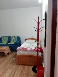 Postel nebo postele na pokoji v ubytování New Summit Guest House