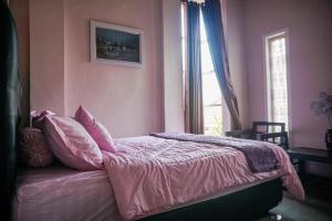 Postel nebo postele na pokoji v ubytování gigafa homestay