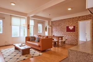 a living room with a couch and a table at Ananya Apartments Phase 1 in Kathmandu