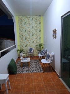 Χώρος καθιστικού στο Quarto triplo com banheiro compartilhado +17 φωτογραφίες