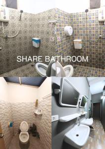 La salle de bains est pourvue d'un lavabo, de toilettes et d'une télévision. dans l'établissement Bann Chana BKK, à Bangkok 20 autres photos