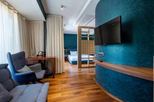 TV a/nebo společenská místnost v ubytování Armagrandi Spina Hotel-Special Category