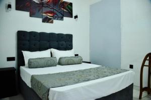 Postel nebo postele na pokoji v ubytování Villa 22 Negombo