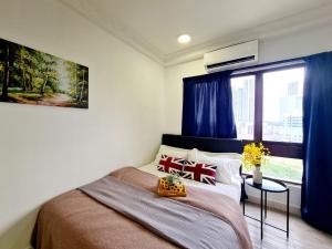 Ένα ή περισσότερα κρεβάτια σε δωμάτιο στο Affordable 8 Guest Tropicana Thomson Hospital Kota Damansara SEGI Giza Mall Tropicana Mall Ikea The Curve One Utama +38 φωτογραφίες