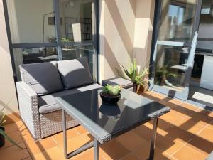 Posezení v ubytování Luxury apartment with sea views private parking and terrace