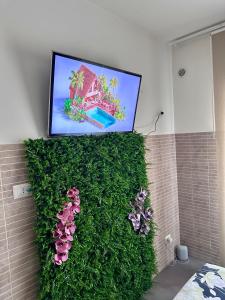 TV a/nebo společenská místnost v ubytování M Boutique Suite