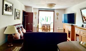 Televízia a/alebo spoločenská miestnosť v ubytovaní Apartmant Split Centar Soleo
