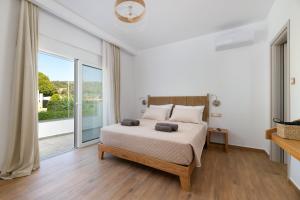 Postel nebo postele na pokoji v ubytování Villa Dana