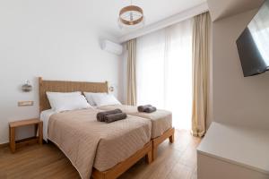 Postel nebo postele na pokoji v ubytování Villa Dana