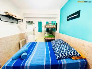 A bed or beds in a room at Elegance Plaza - Salou Suites