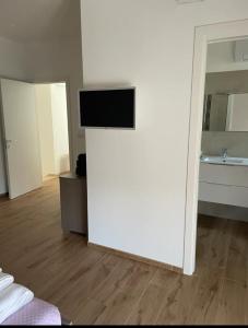 Televisyen dan/atau pusat hiburan di b&b a pochi passi dal mare