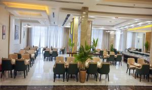 Restaurace v ubytování فندق المدى العربية الفندقية