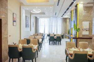 Restaurace v ubytování فندق المدى العربية الفندقية