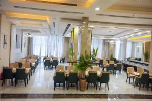 Restaurace v ubytování فندق المدى العربية الفندقية