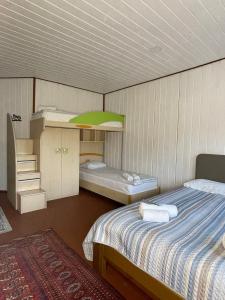 Postel nebo postele na pokoji v ubytování Hotel Galushko