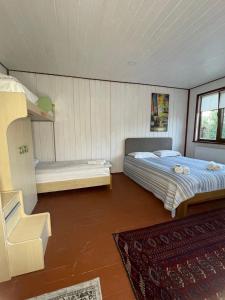 Postel nebo postele na pokoji v ubytování Hotel Galushko