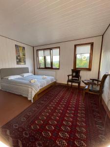 Postel nebo postele na pokoji v ubytování Hotel Galushko