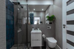 Ένα μπάνιο στο Apartament Kościuszki 47m44