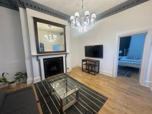 TV a/nebo společenská místnost v ubytování First Floor One Bed Apartment In Central West London