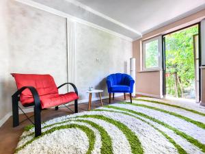 Et opholdsområde på Artik Apartment