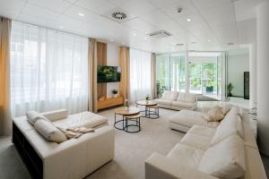 TV a/nebo společenská místnost v ubytování Hotel Silenzio
