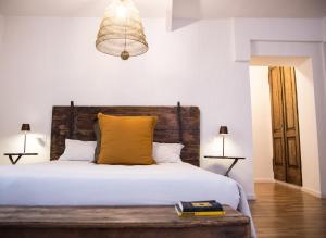 Posteľ alebo postele v izbe v ubytovaní Locanda 53 + 30 fotografií