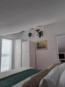Postel nebo postele na pokoji v ubytování Apartments Tanya