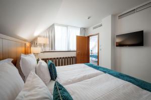 Hotel Silenzio客房内的一张或多张床位