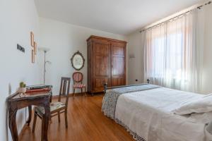 A bed or beds in a room at B&B Il Ramaiolo