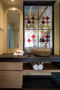 Koupelna v ubytování ELG Contessa Boutique Hotel + 37 fotografií