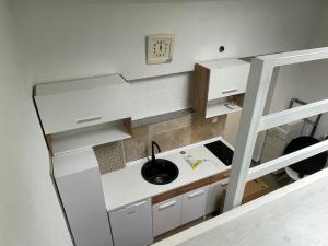 Postel nebo postele na pokoji v ubytování Studio apartman Bišće