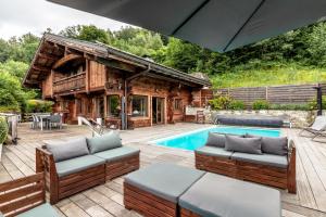 Kolam renang di atau dekat dengan Chalet Hygge - Piscine - Calme