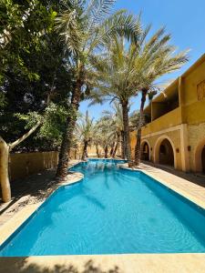 Bazén v ubytování Nour El Waha Hotel nebo v jeho okolí