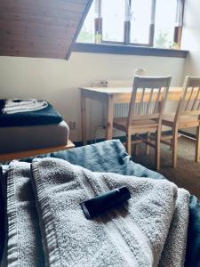 Letto o letti in una camera di Hvězdonice Hostinec U Kuželků